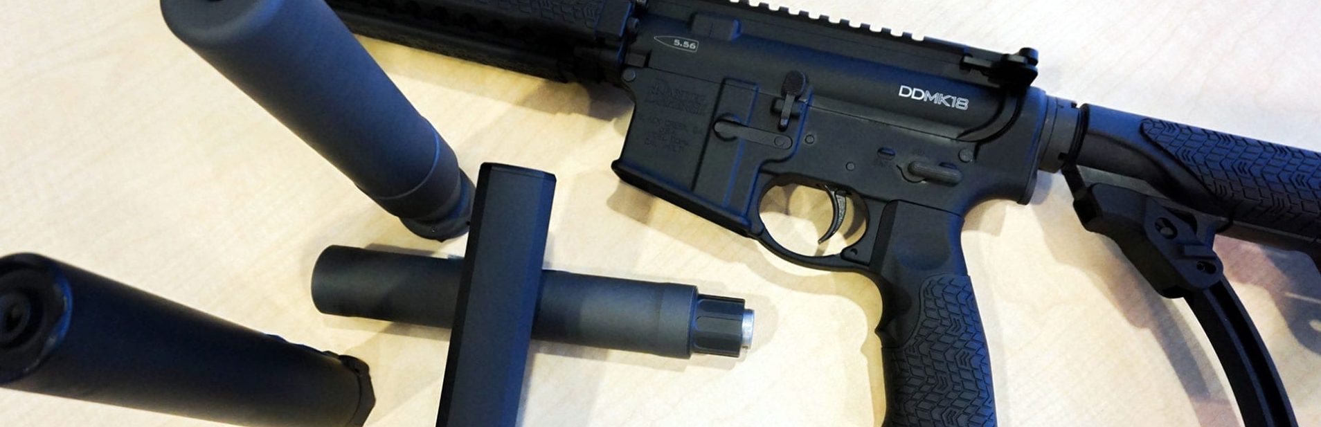 Firearm Storage 2 weapon parts on table | Firearm Storage